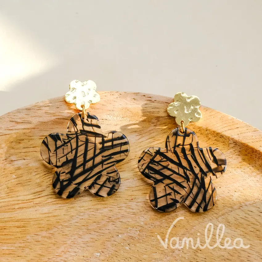 Boucles noires rayées en acier inoxydable doré