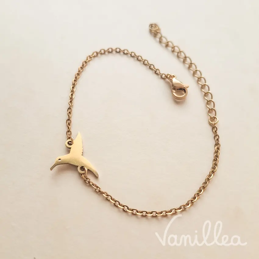 Bracelet oiseau doré femme en acier inoxydable