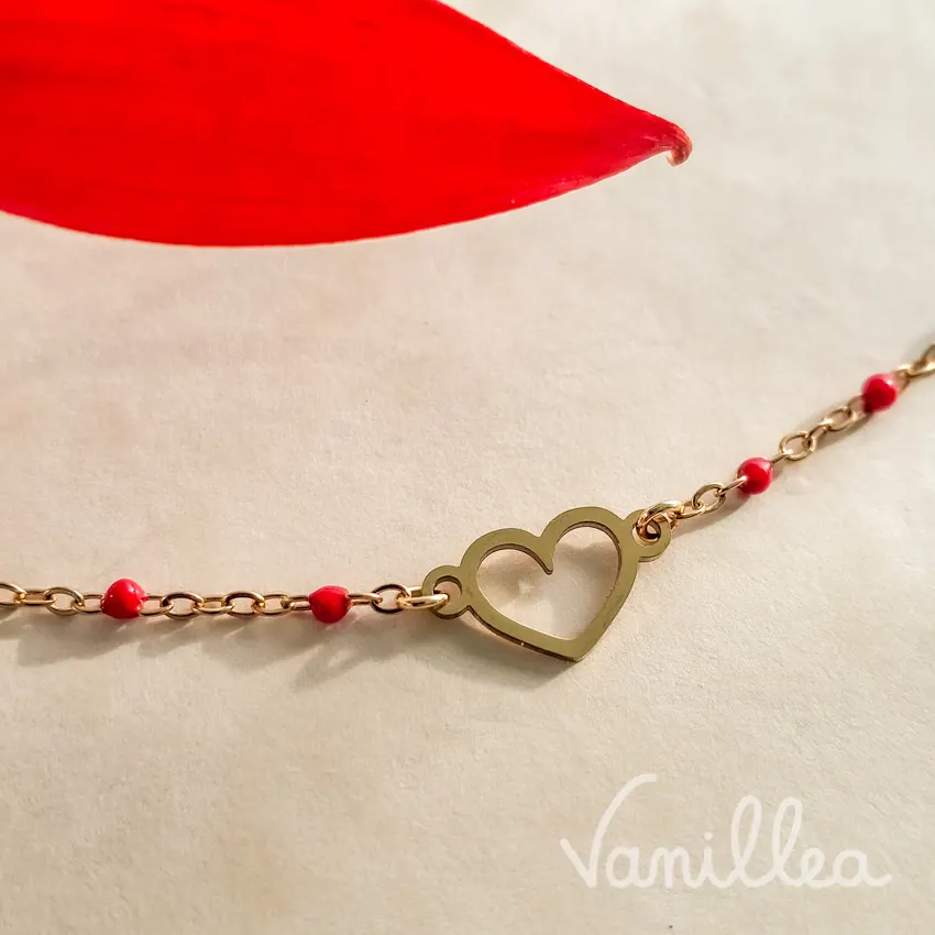 Bracelet coeur doré en acier inoxydable avec détails rouges