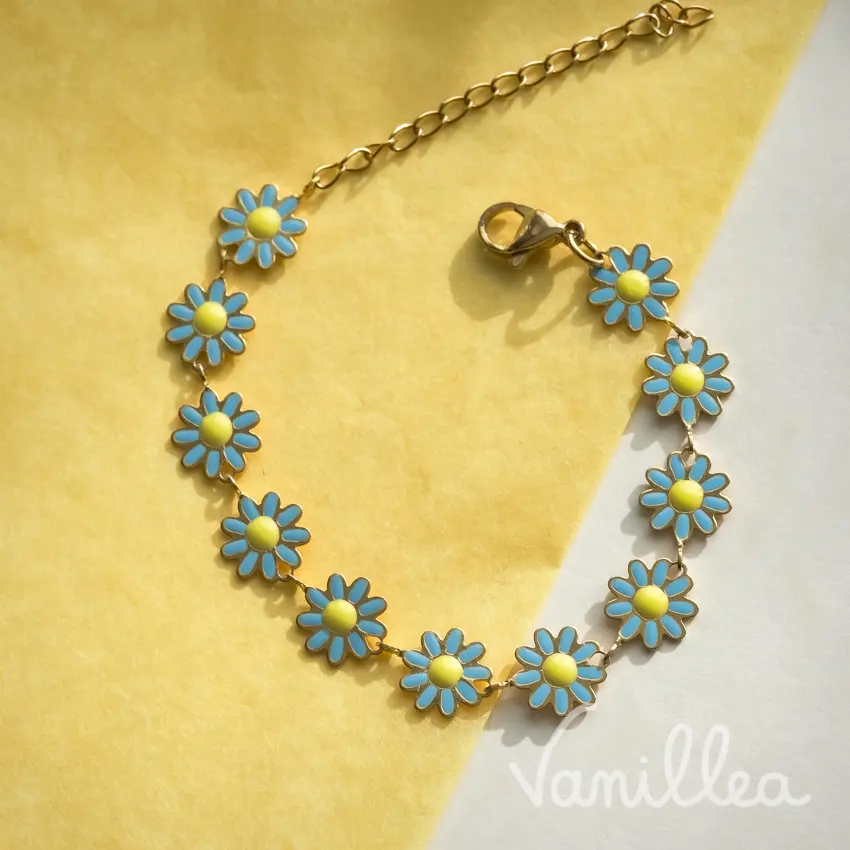 Bracelet fleurs bleues marguerites doré