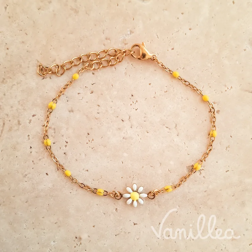 bracelet marguerite perles jaunes gros plan acier inoxydable