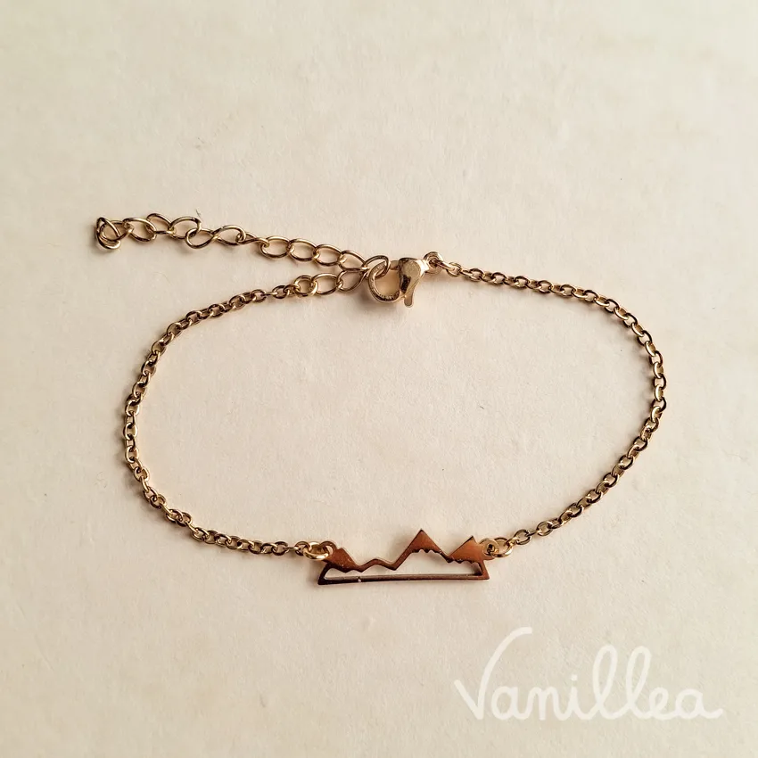 Bracelet montagne minimaliste doré ajustable