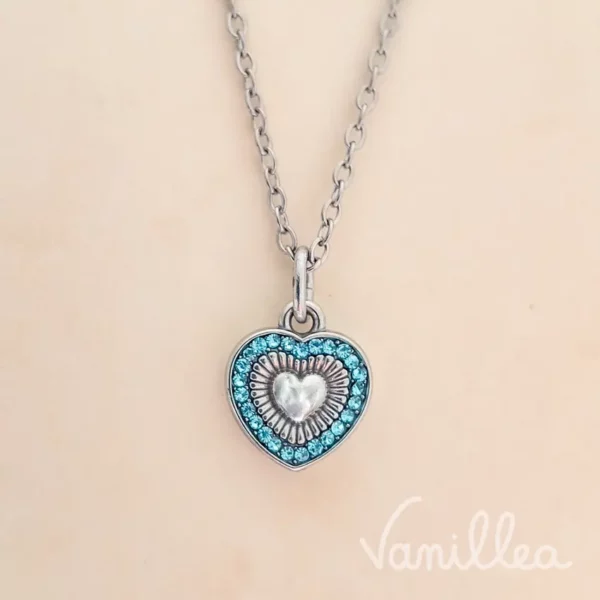 Collier cœur argenté strass bleus avec pendentif double cœur
