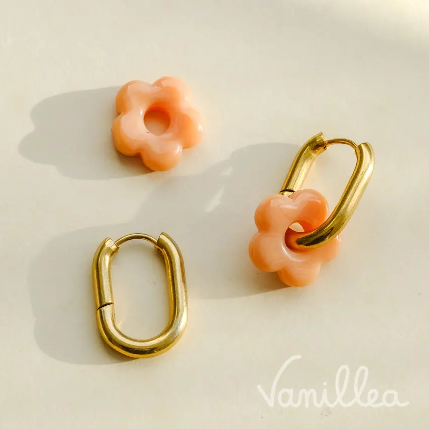 Boucles FIORELLA avec fleur en verre orange