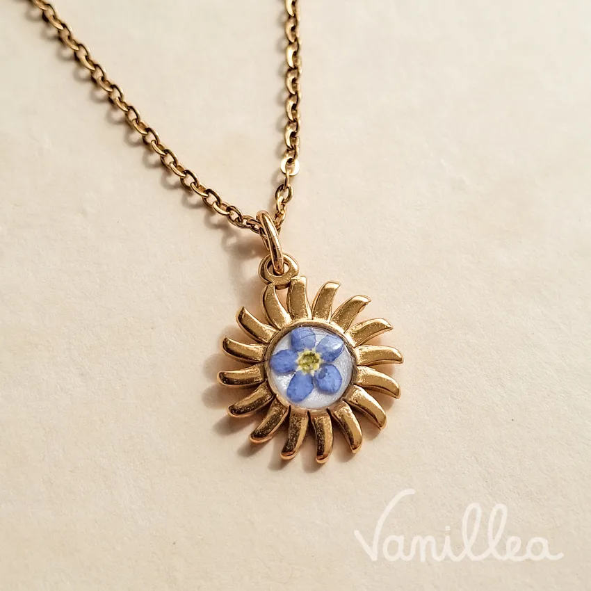 Collier myosotis fleur naturelle doré