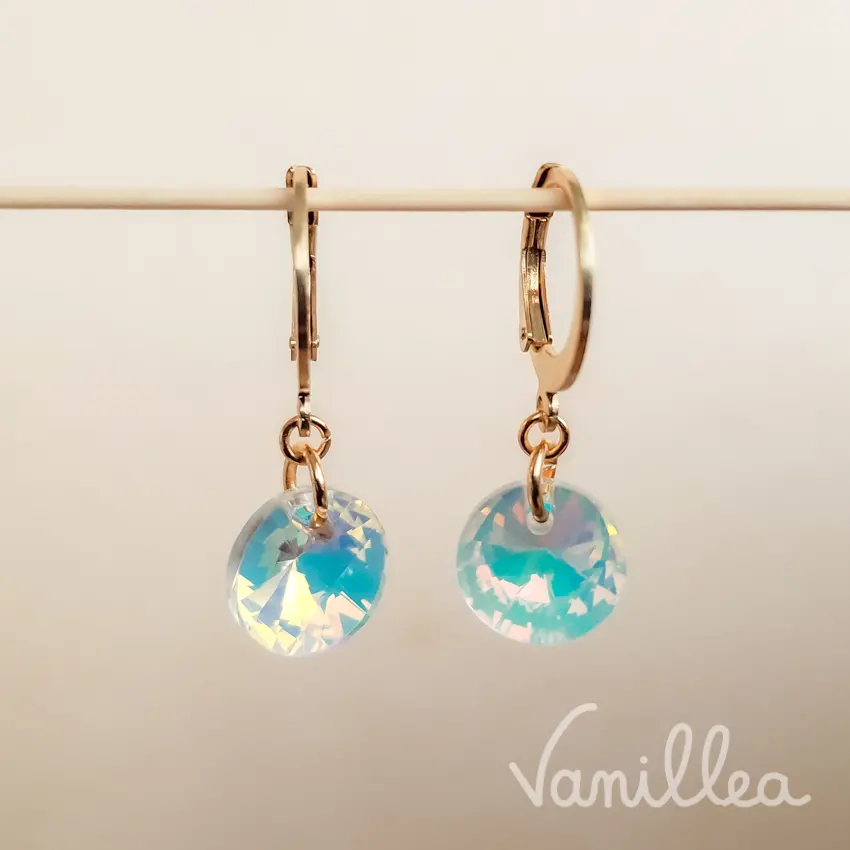 Boucles dormeuses cristal irisé dorées en acier inoxydable
