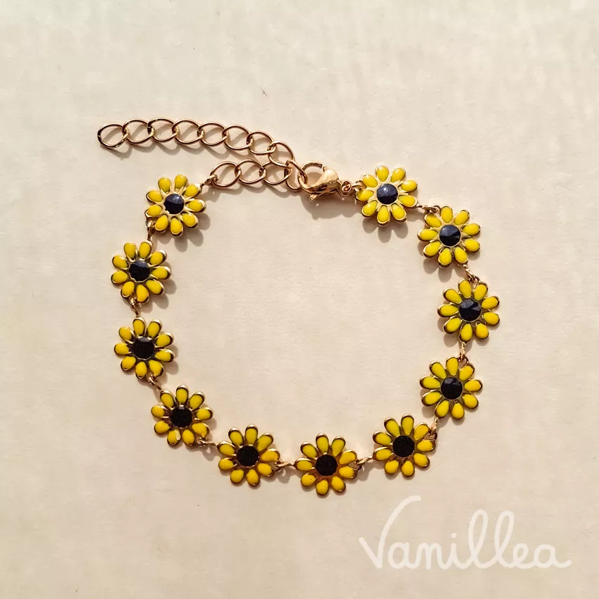 bracelet marguerite jaune cœur noir acier inoxydable vue dessus