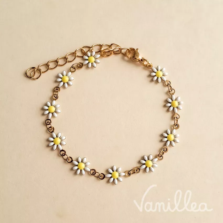 bracelet petites marguerites blanches acier inoxydable doré vue dessus